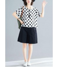 white dotted casual blended pullover and black elastic waist shorts